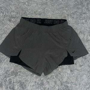 Grey and black nike athletic training shorts